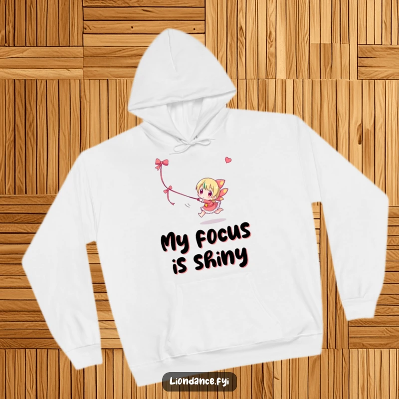 Funny hoodie featuring a character playfully chasing a dangling ribbon, offering comfort and a dose of whimsical fun.
